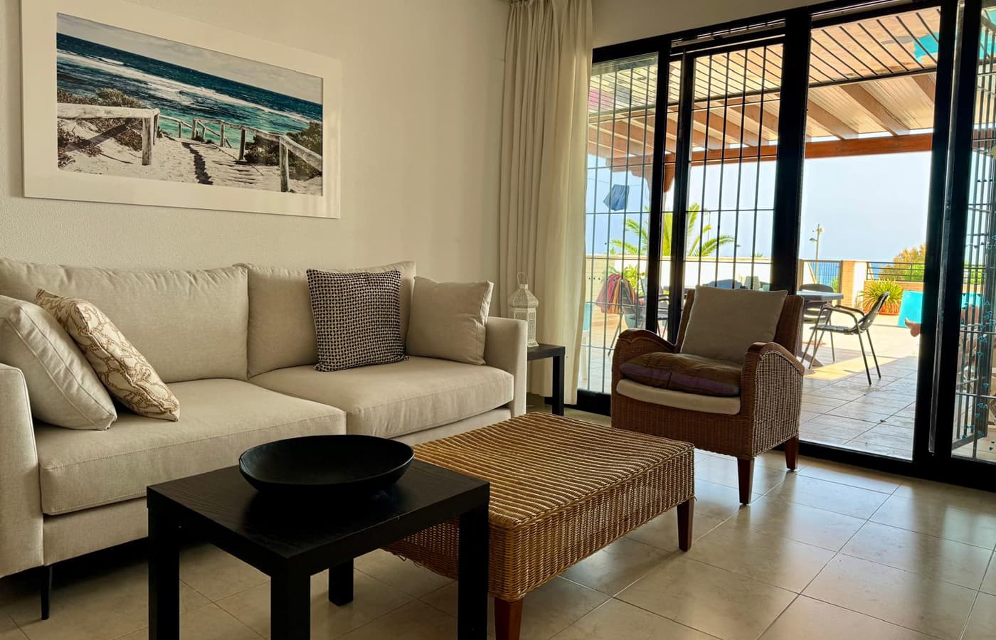 Living room with sofa and a view through to the terrace