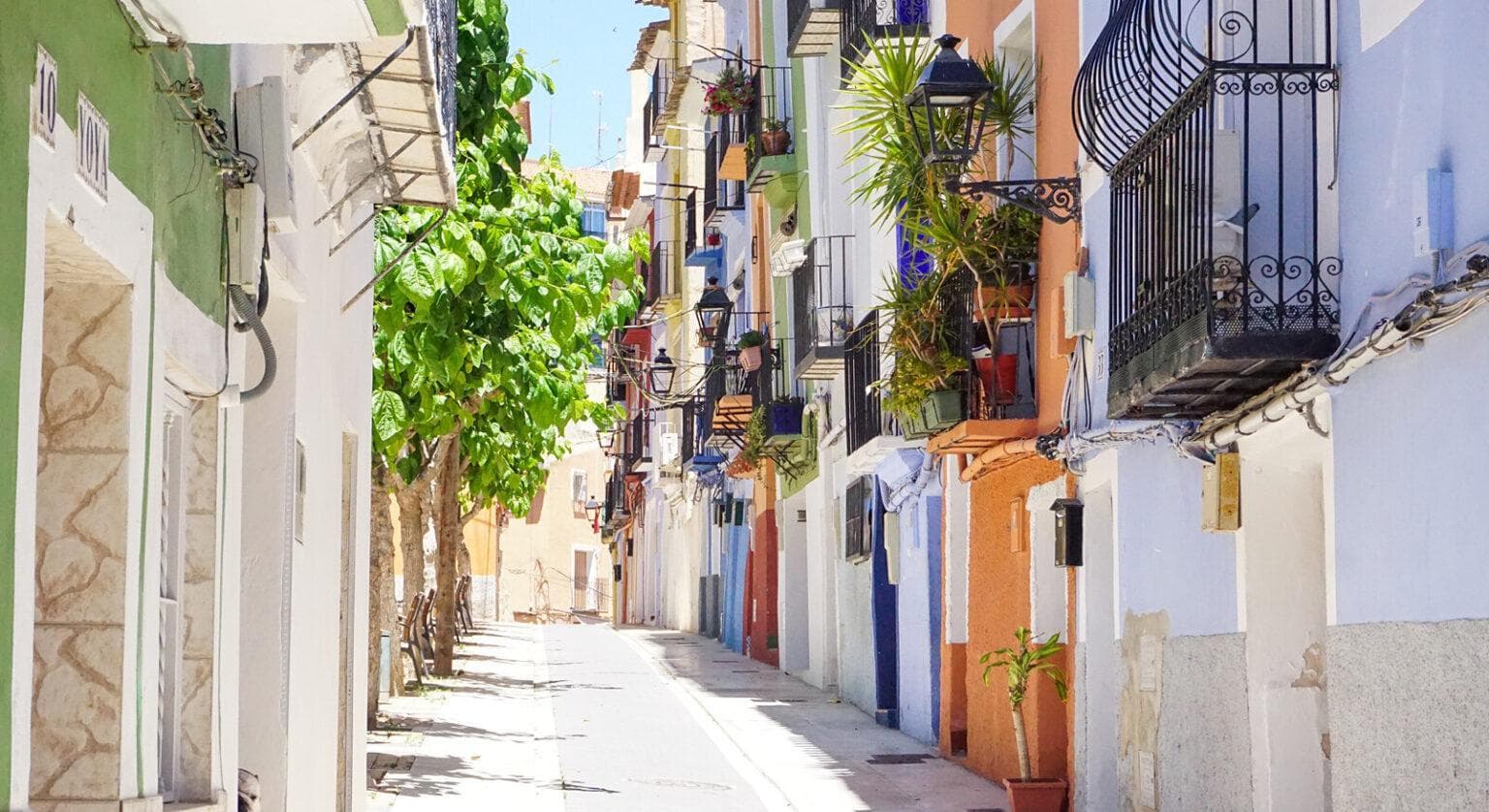 A street of colourful houses in the old town of Villajoyosa